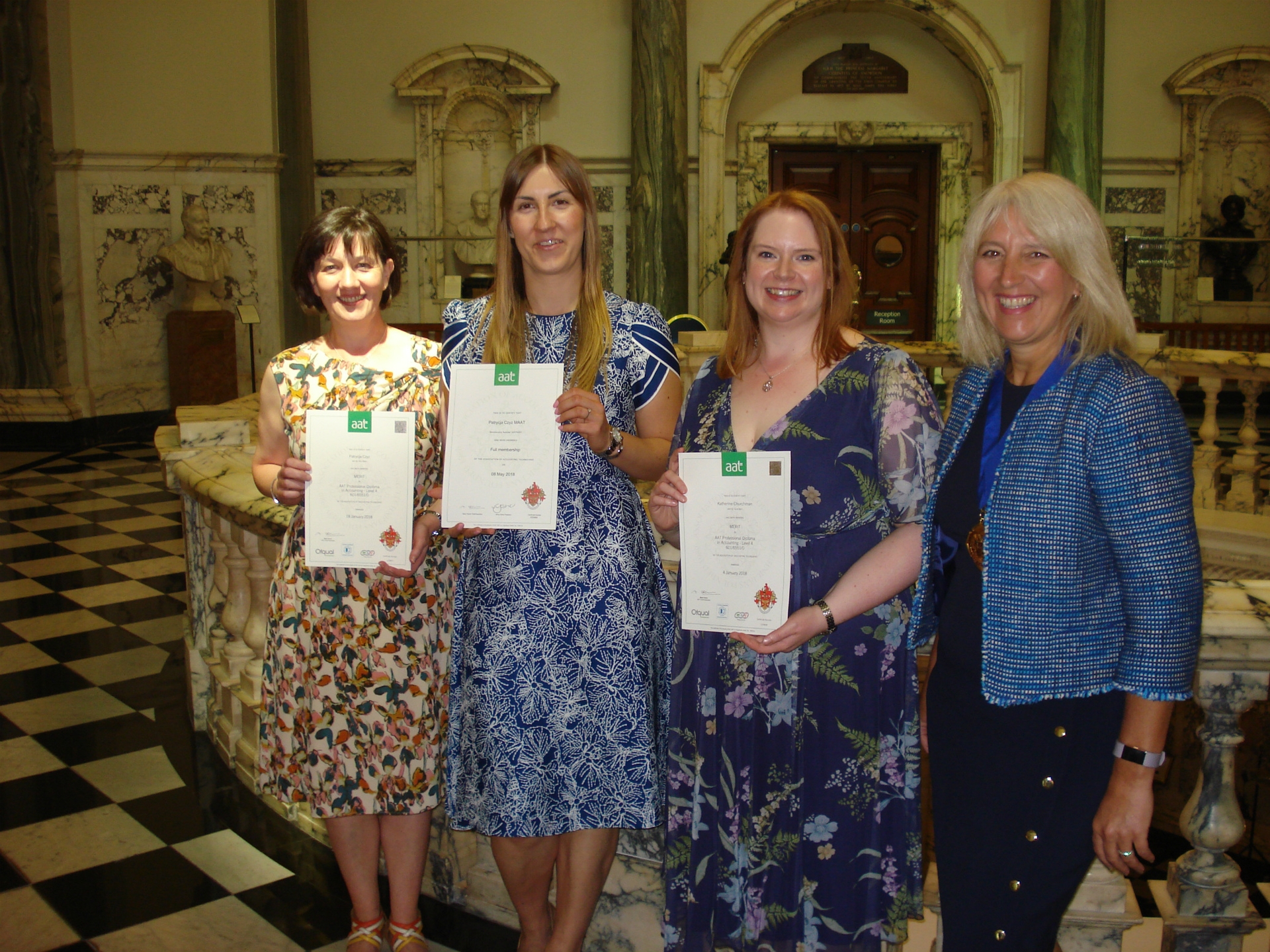 image: Nicky Fisher, AAT President presenting achievement awards in Belfast