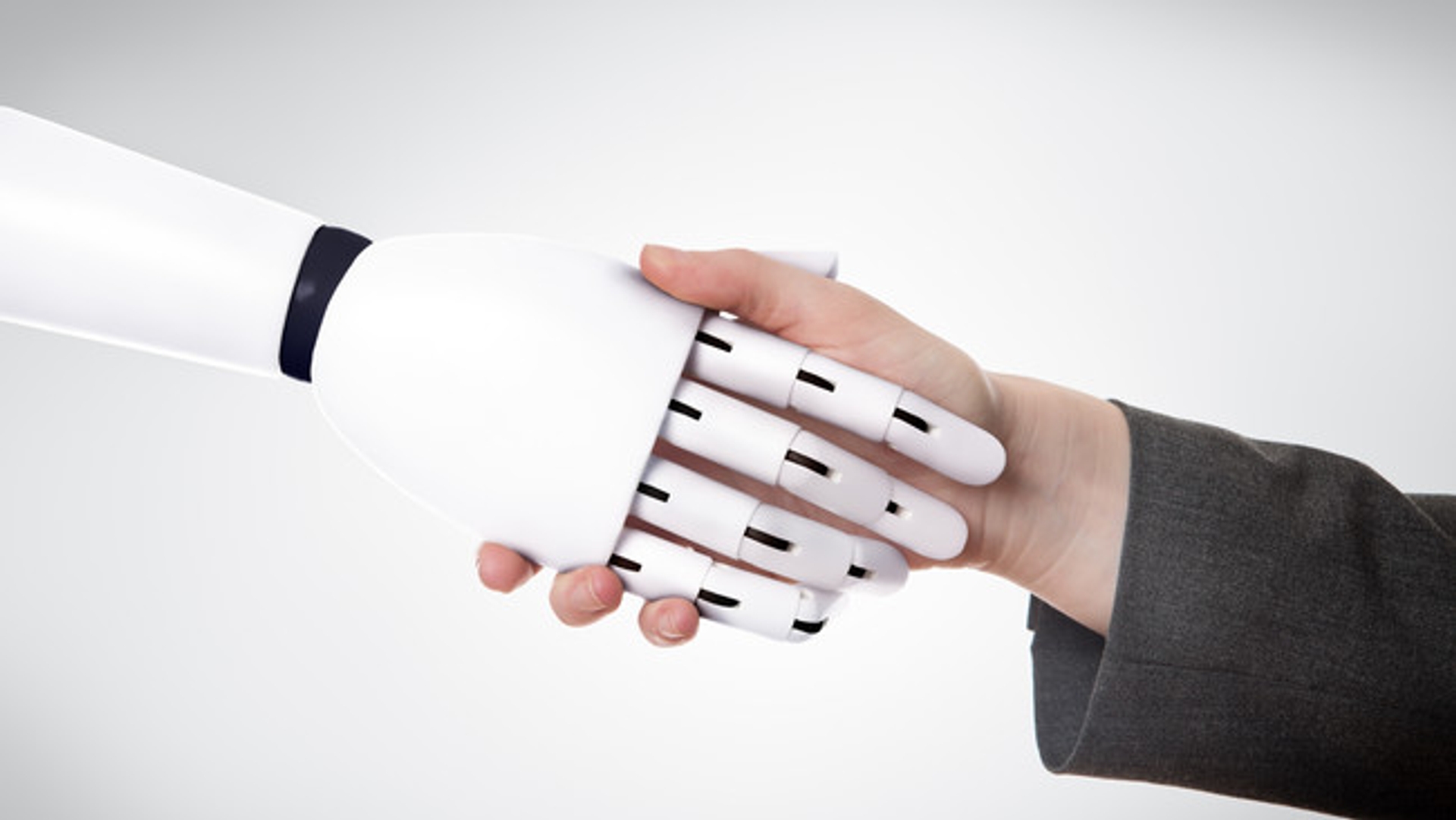image: human robot handshake