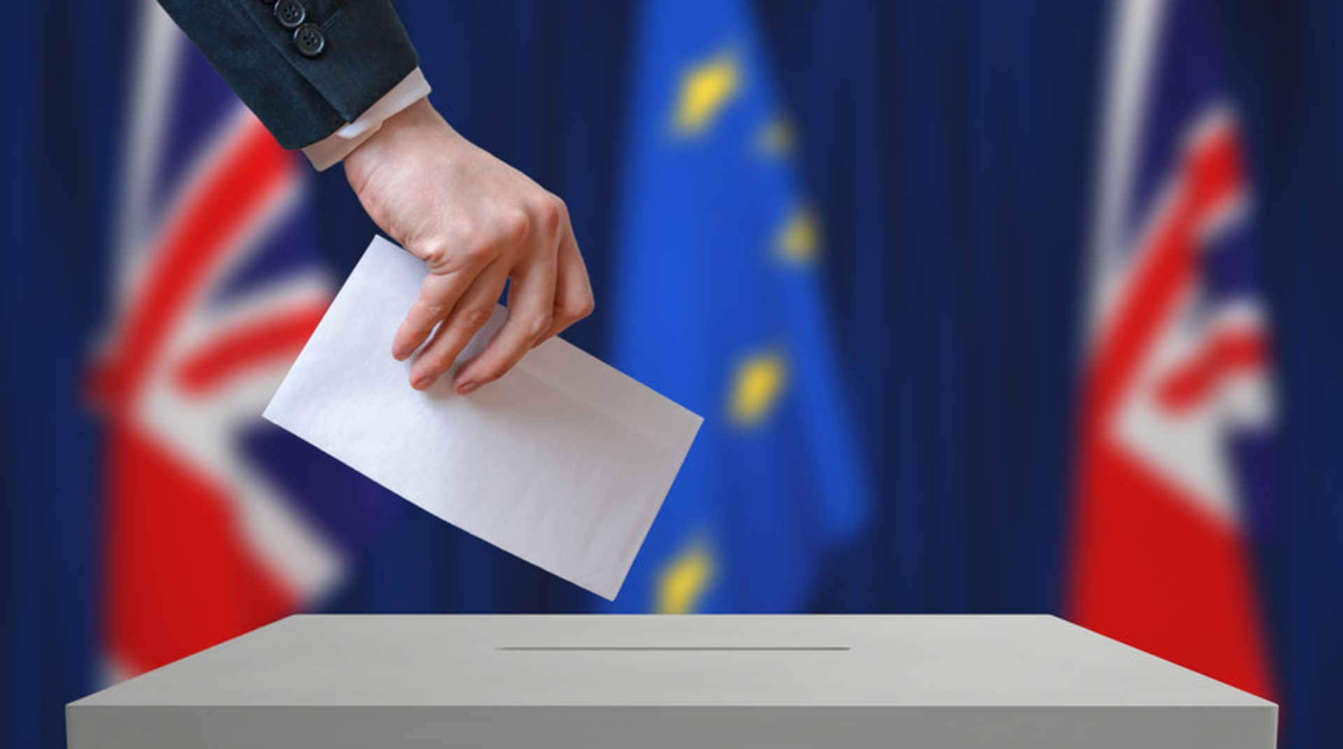image: person casting a ballot with British and EU flags in background