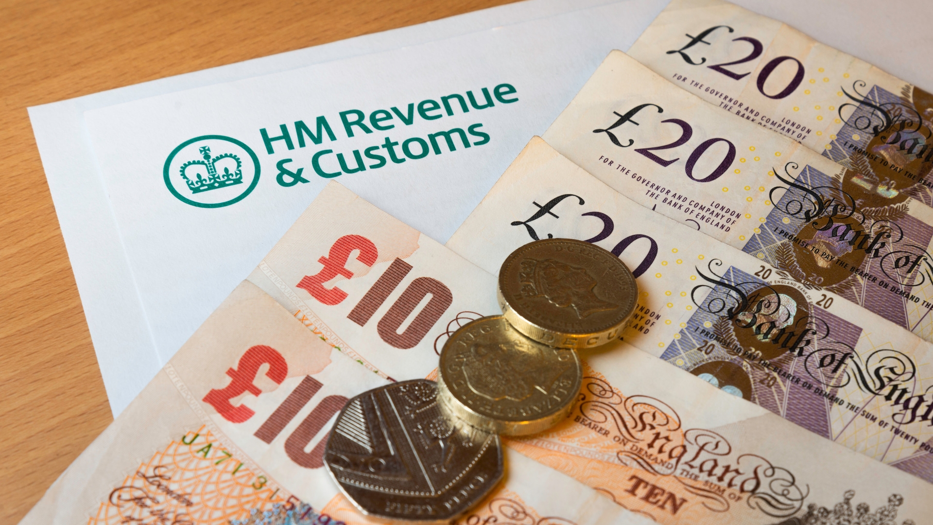 image: HMRC form and cash