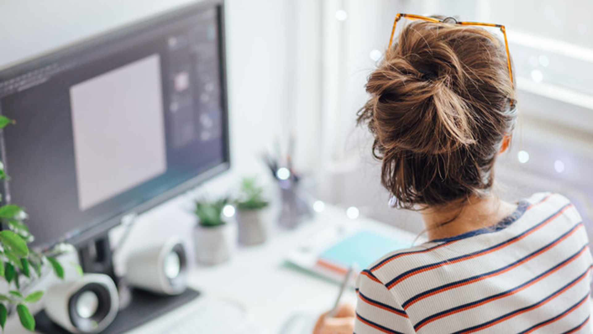 image: person working in front of screen