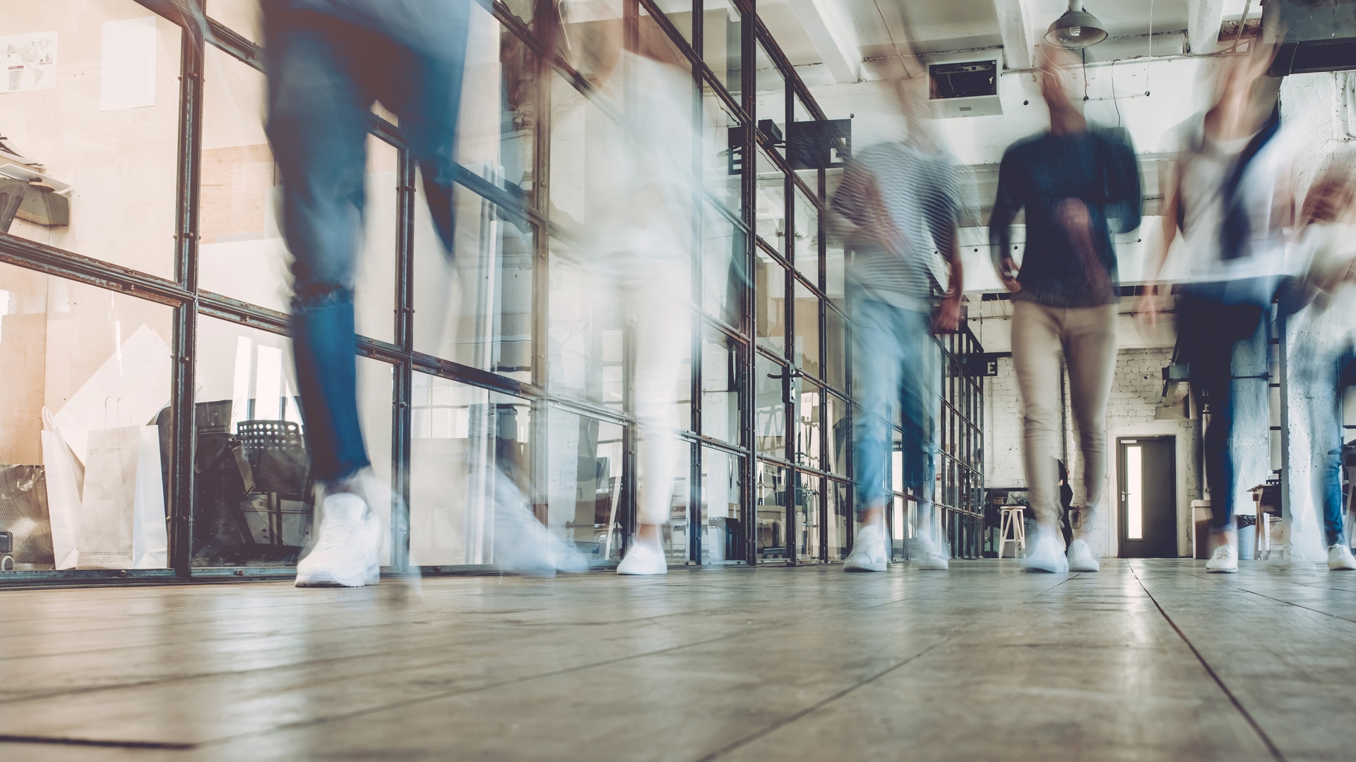 image: workers in a corridor