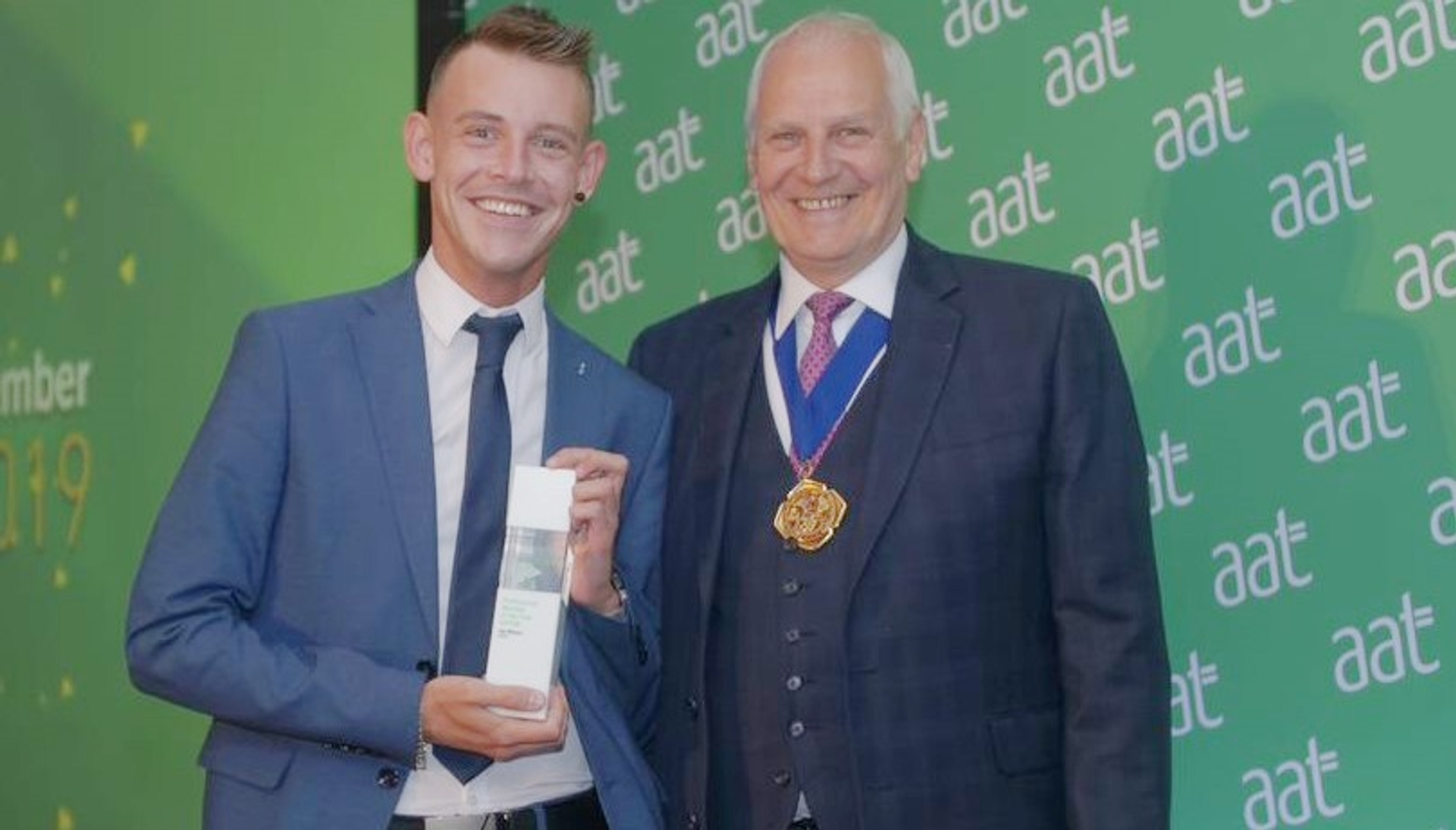 Pictured: Jay Wilson, Professional Member of the Year (AATQB), with AAT President Vernon Anderson