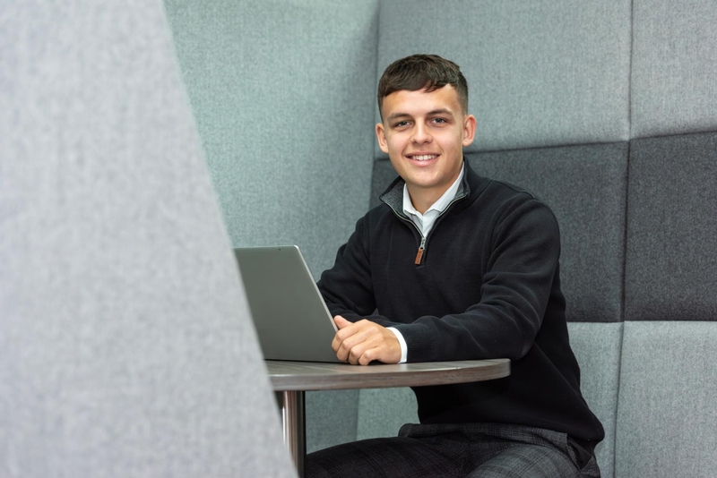 An apprentice completing work